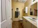 Clean bathroom with a vanity sink, cabinet, and toilet at 1234 E Schwartz Blvd, Lady Lake, FL 32159