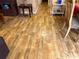 Hallway features durable wood-look flooring providing continuity and style throughout the home at 1234 E Schwartz Blvd, Lady Lake, FL 32159