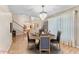 Dining area featuring a round table, seating for four, and natural light creating an inviting space at 16456 Meredrew Ln, Clermont, FL 34711