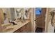 Bathroom featuring double sinks and decorative towels and toilet room at 1670 Kensington Pl, The Villages, FL 32162