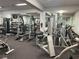 Community fitness center with state-of-the-art exercise equipment and mirrored walls at 21051 Royal St Georges Ln, Leesburg, FL 34748