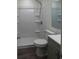 Bathroom featuring shower, toilet, vanity and wood look flooring at 2210 Grant Ave, Eustis, FL 32726