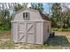 Backyard storage shed at 2256 Lake Pointe Cir, Leesburg, FL 34748