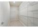 Walk-in closet featuring wire shelving and neutral walls at 2365 Palm Park Loop, Clermont, FL 34714