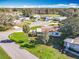 Aerial view of a home, showcasing its location within a well-kept community and lush greenery at 25546 Belle Alliance, Leesburg, FL 34748