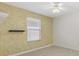 This bedroom features neutral walls, blinds, and a ceiling fan at 3176 Atwell Ave, The Villages, FL 32162