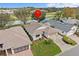 An aerial view of a home showcasing it's proximity to the water at 321 Ranchwood Dr, Leesburg, FL 34748