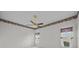 The main bedroom has a ceiling fan and is bright with natural light at 321 Ranchwood Dr, Leesburg, FL 34748