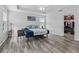 Main bedroom showcasing wood floors and a large walk-in closet for ample storage at 3318 Dzuro Dr, Oxford, FL 34484