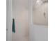 Tiled shower with glass door and ample room in the bathroom at 3318 Dzuro Dr, Oxford, FL 34484