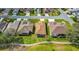 Aerial view of the home, showcasing lush landscaping and a community golf course at 4835 Kelso St, Leesburg, FL 34748