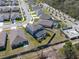 Aerial view of home with screened in pool, fenced in backyard, and neighborhood surroundings at 5363 Timberland Ave, St Cloud, FL 34771