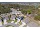 Aerial view of a home with solar panels, a fenced yard, and neighborhood surroundings at 5363 Timberland Ave, St Cloud, FL 34771