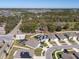 Wide aerial view of a home with solar panels, a fenced yard, and neighborhood surroundings at 5363 Timberland Ave, St Cloud, FL 34771