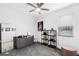 Bright and airy bedroom features a walk-in closet, neutral color palette, and ample natural light, creating a relaxing atmosphere at 7193 Dilly Lake Ave, Groveland, FL 34736