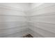 Walk-in pantry with abundant wire shelving for storage at 7315 Cornwall Way, The Villages, FL 34762