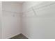 Spacious walk-in closet with wire shelving at 7315 Cornwall Way, The Villages, FL 34762