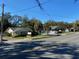 Street view showcasing a one story commercial building featuring well maintained lawn and elegant signage at 911 N Donnelly St, Mount Dora, FL 32757