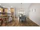 Dining room with a view into the kitchen and living room at 9243 Se 171St Cooper Loop, The Villages, FL 32162