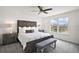 Tranquil bedroom featuring natural light, stylish ceiling fan, and decor at 3040 Tansy St, Tavares, FL 32778