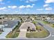 An aerial view displays a well-maintained home on a corner lot within a pleasant, residential neighborhood at 11945 Se 91St Cir, Summerfield, FL 34491