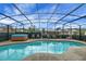 Screened pool with hot tub at 12338 S Putney Ct, Leesburg, FL 34788