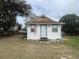 View of the exterior of a home with a well-kept lawn and attractive landscaping at 13738 State Road 33, Groveland, FL 34736