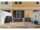 Outdoor patio featuring comfortable seating, a grill, and a privacy fence at 14157 Oasis Cove Blvd # 104, Windermere, FL 34786