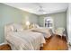 Comfortable bedroom with two beds and a bright window view at 1537 Eastover Ter, The Villages, FL 32162