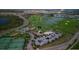 Stunning aerial view of golf course, tennis courts, lakes and community amenities in a desirable location at 1614 Moon Valley Dr, Davenport, FL 33896