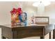 A welcoming entrance table featuring a snack basket and decor accents at 1614 Moon Valley Dr, Davenport, FL 33896