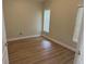 Cozy bedroom with modern flooring and large windows at 1661 Stafford Springs Blvd, Mount Dora, FL 32757