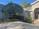 Well-maintained front yard features a manicured lawn, mature landscaping, and a decorative tree at 1661 Stafford Springs Blvd, Mount Dora, FL 32757