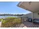 Wooden deck offering a panoramic view of the lake at 18944 Bates Ave, Eustis, FL 32736