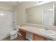 Bathroom with a bath tub and shower, toilet, mirror, and vanity at 201 Andover Dr, Davenport, FL 33897