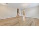 Spacious living room featuring hardwood floors, neutral walls, and lots of sunlight at 201 Andover Dr, Davenport, FL 33897