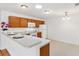 Cozy kitchen area with a breakfast bar at 2245 Hanover Ter, The Villages, FL 32162