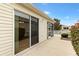 Outdoor patio featuring sliding glass doors at 2245 Hanover Ter, The Villages, FL 32162