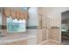 Bathroom with a large tub, separate shower and lots of natural light at 25274 Lost Oak Cir, Leesburg, FL 34748