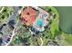 Aerial view of community pool and clubhouse with a large pool, playground and lounge area at 2754 Sun Key Pl, Kissimmee, FL 34747