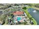 Overhead view of community pool and clubhouse with a large pool, hot tub, and recreation area at 2754 Sun Key Pl, Kissimmee, FL 34747