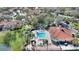 Overhead view of community pool and clubhouse with a large pool, hot tub, and lounge area at 2754 Sun Key Pl, Kissimmee, FL 34747