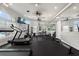 Well-equipped fitness center featuring modern exercise machines and ample workout space at 2754 Sun Key Pl, Kissimmee, FL 34747