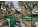 Enjoy a leisurely game of mini golf surrounded by mature trees at 2754 Sun Key Pl, Kissimmee, FL 34747