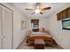 Comfortable bedroom featuring a window for natural light and neutral-toned walls at 31241 Benton Dr, Eustis, FL 32736