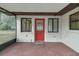 Enclosed porch features direct access to the exterior and interior of the home at 31241 Benton Dr, Eustis, FL 32736