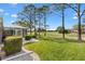 The backyard overlooks a pristine golf course providing scenic views and natural beauty at 3163 Southern Trce, The Villages, FL 32162