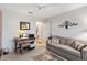 Bedroom with neutral tones, desk, and view of hall at 3163 Southern Trce, The Villages, FL 32162