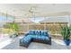 Relaxing sunroom featuring comfortable seating, ceiling fan and screened windows at 3564 Nomad Ter, The Villages, FL 32163