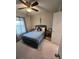 Bedroom featuring carpet floors and a modern ceiling fan at 3629 Maidencain St, Clermont, FL 34714